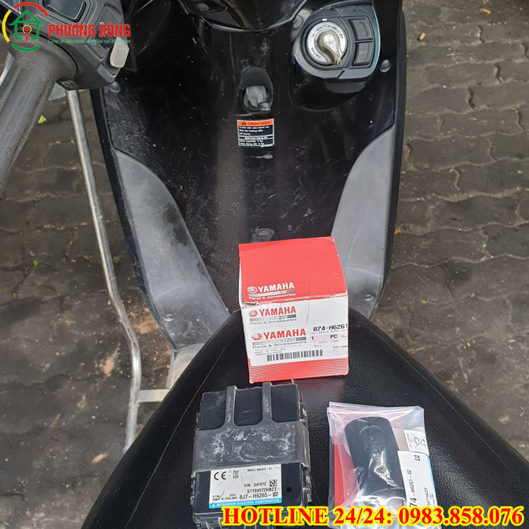 sửa chìa khóa xe janus hết pin